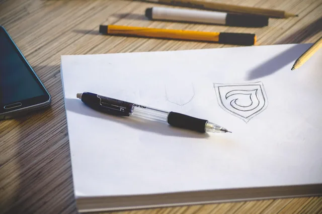 desk, workspace, pencil, paper, logo, sketch, work, office, office desk, workplace, table, document, notebook, drawing, designing, pens, white paper, logo, logo, logo, logo, logo. Celebrity Baby Name Trademark: USPTO Rules vs Reality